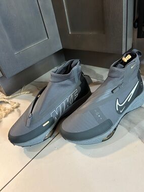 Nike Women’s Grey High-Top Zip Sneaker with Black Accents